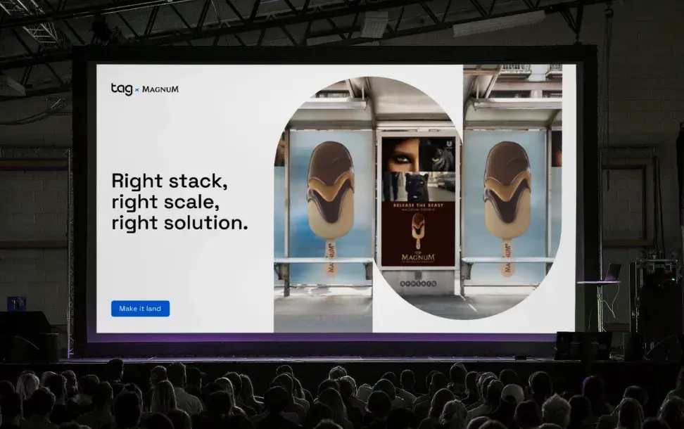 Presentation screen showing a Magnum ice cream advertisement with the text "Right stack, right scale, right solution" and a "Make it land" button.